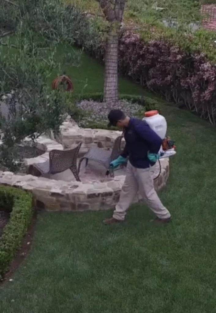 Technician treating a property.